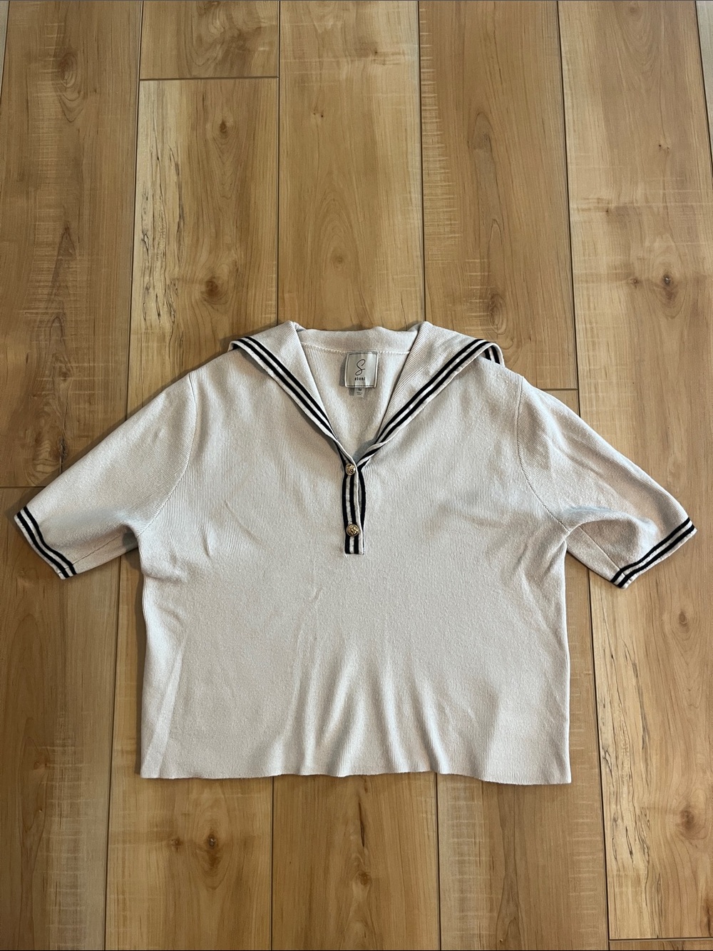 Sioni Cream Knit Top with Black Stripe Trim